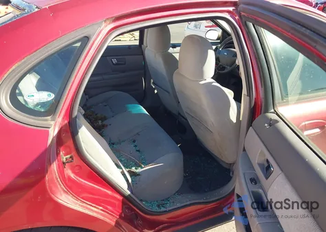 2001 Ford Taurus Se z USA, uszkodzony, nr VIN 1FAFP53UX1G169507